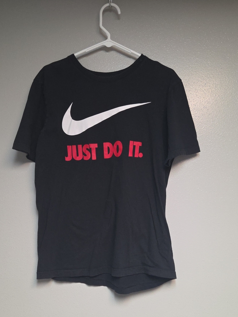 Nike Black T-Shirt with White Swoosh and Red "Just Do It." Graphic